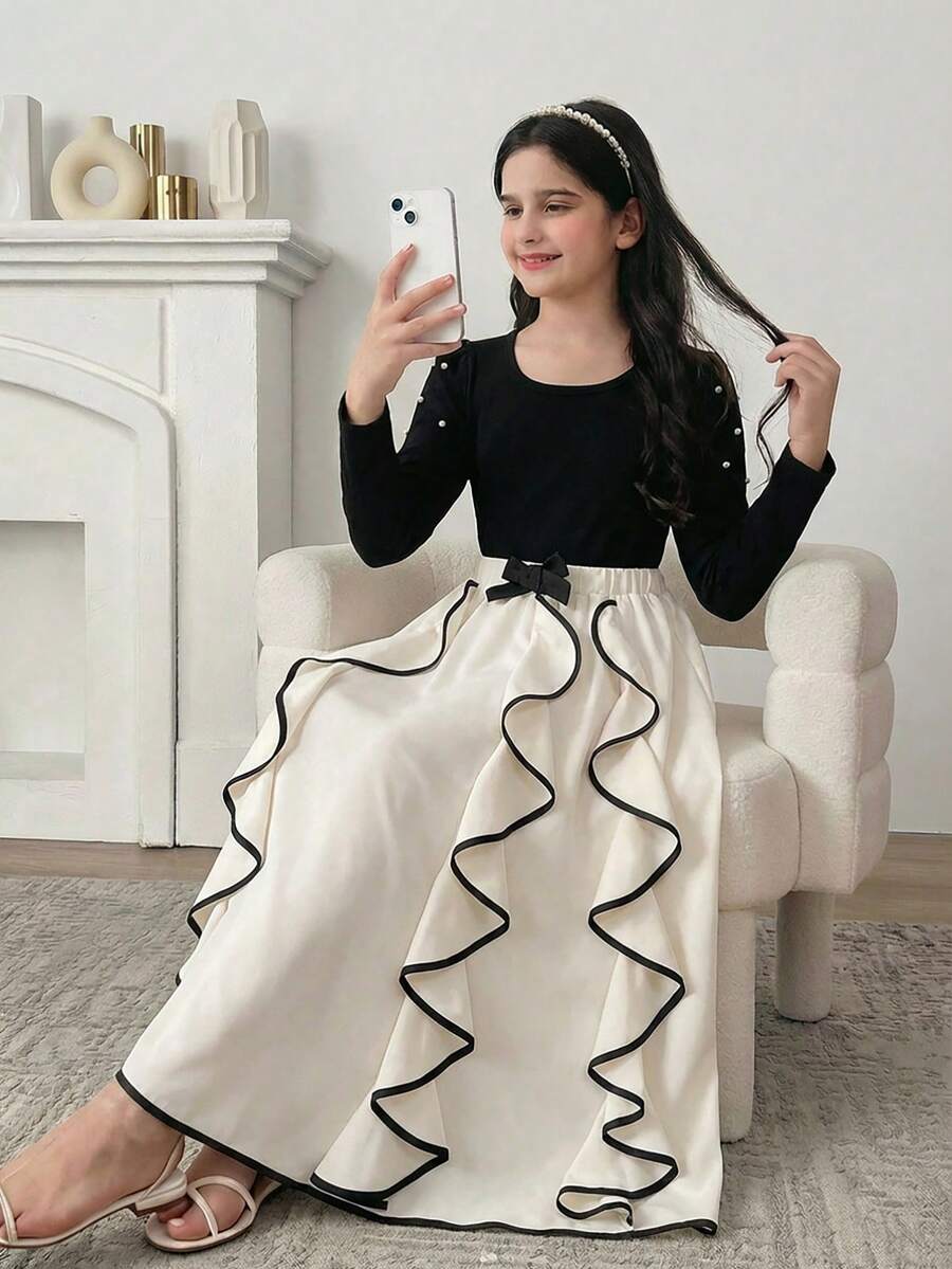 SHEIN 2 Stücke traditionelles arabisches Outfit für Mädchen, beinhaltet Pullover mit Rundhalsausschnitt und Langarm sowie Rock mit Rüschensaum und Schmetterlingskante, geeignet für Frühling, Sommer, Herbst, Winter, Lässig, Outdoor, Urlaub, Party, festliche Anlässe