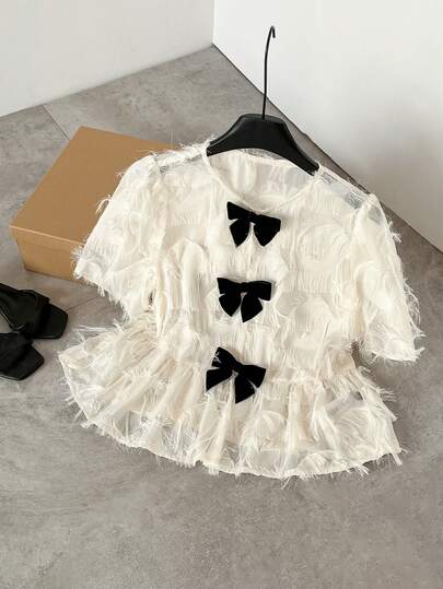 SHEIN Frenchy Women's Casual Round Neck Short Sleeve Shirt With Bow Decor,French Light Luxury Feather Tassel Black Bow Decoration Top,Short-Sleeved Fitted Sweet Doll Shirt,Jacquard Tassel Chiffon Texture Fabric,Summer Holiday Outfits,Vacation Outfits For Women,Elegant Women's Blouses,Bridesmaid Tops,Party Top