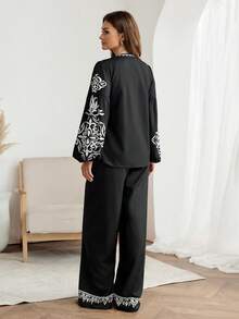 Easowa V领镂空蝴蝶结灯笼袖上衣和侧袋阔腿裤两件套，印花图案，休闲优雅的办公/度假女装，春夏款 - 黑色 - 查看 7