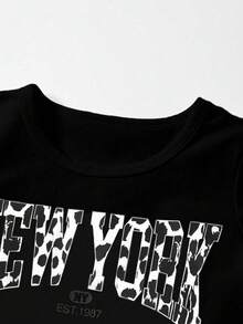 Sparklyn Tween Girls' Summer Back To School T-Shirt Set, White Solid Knit Fabric With Leopard Print & English Letter Graphic T-Shirt Top Paired With Black Bow Accent Woven Fabric Casual Pants, 2pcs Outfit Suitable For Summer, Casual, Fashion, Street Style, Back To School, Travel, Photo Shoot Cheetah Print Girls Set Animal Print Top Leopard Print Pants Ladies Casual Fashion Animal Print Outfit Leopard Print Set Baddie Outfit Cheetah Print Pants Leopard Outfit - Black - View 4