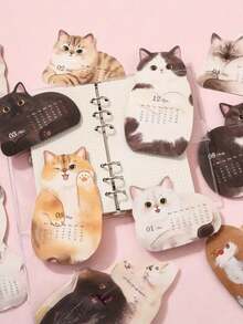 1本可爱小猫咪日历 - 月度计划本，包含萌萌的猫咪图案，涵盖2026年1月至12月 - 适用于家庭、办公室、学校 - 是送给爱猫人士和宠物主人的理想礼物 - 俏皮小猫咪主题，纸质材料，英文版式，月度布局，月度计划本 | 趣味设计 | 纸质，猫咪日历 - 彩色 - 查看 6