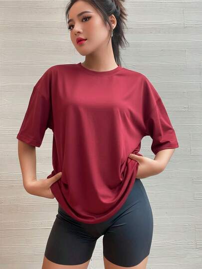 Mujer camiseta deportiva estilo moderno tejido transpirable diseño sólido ajuste holgado cuello redondo manga corta primavera verano gimnasio entrenamiento