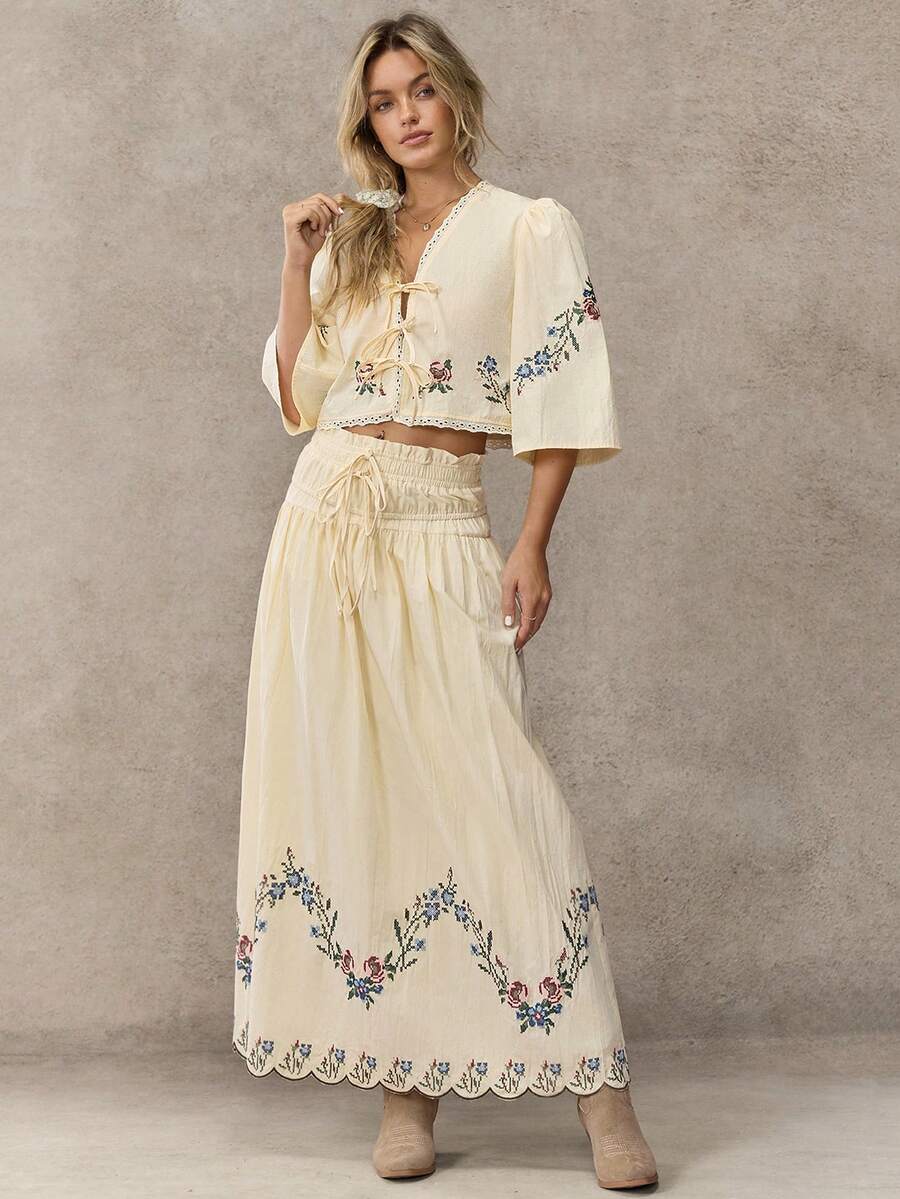 WESTFADE Chân váy midi chữ A thêu hoa, eo dây rút, xếp ly.