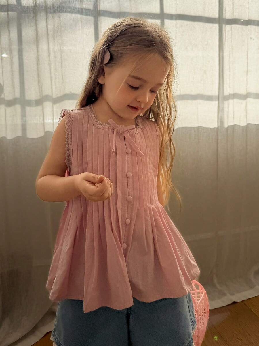 Dazy Kids Áo kiểu Hàn Quốc xếp ly bèo nhún không tay thắt nơ cho bé gái - Hồng - Xem 1