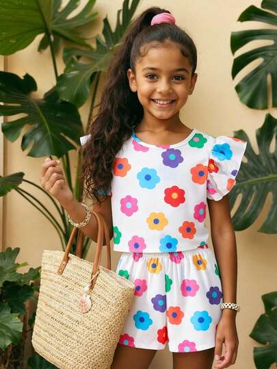 Girls' Summer 2 Pieces Set: Bright Floral Short-Sleeve Top And Shorts Set. Designed For Sunny Days, It Is Suitable For Casual Outings, Park Gatherings, Family Picnics, Beach Strolls, Vacations, Or Daily Summer Wear. The Lightweight Fabric Keeps Her Cool; The Lively Floral Pattern Adds Cheerful Charm, Making It An Ideal Choice For Comfortable And Stylish Summer Occasions.