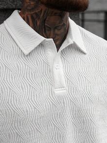 Manfinity CasualCool 男士白色针织提花Polo衫，百搭日常穿着，适合各种场合，包括周末旅行、户外活动、探险旅行、轻松的工作环境或半正式场合。也是送给男友/丈夫、周年纪念/生日、派对、暑假、新年、婚礼、情人节等场合的理想礼物。 - 白色 - 查看 6