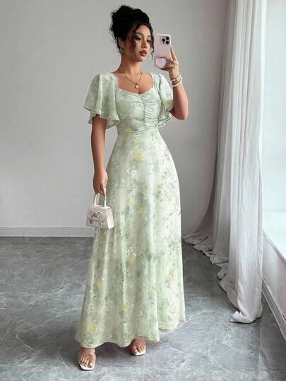 Modelyn Damklänning i chiffong med fjärilstryck och veckad fåll, söt fransk stil, sommar