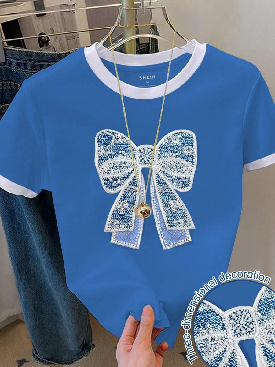 Resyla Áo thun nữ tay ngắn cổ tròn kiểu dáng thường ngày, đính nơ và hạt cườm. - Màu xanh lam - Xem 1