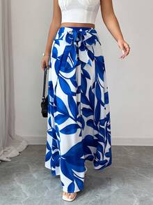 Elenzga 这款女士优雅高腰系带蓝色印花半身裙，尽显精致优雅。适合各种场合，从正式工作装和通勤装，到性感装扮、浪漫法式风、休闲外出、度假、中东复古主题活动、温馨下午茶聚会、魅力派对，以及新年、感恩节、圣诞节、情人节和其他节日庆祝活动。 - 藍白色 - 查看 4