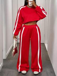 Slaydiva Nouvelle tenue automne/hiver pour femme, tenue de rentrée scolaire, costume d'Halloween, style business casual, tenue de tous les jours, streetwear à la mode, style académique vintage, chic sportif, sweat-shirt à manches longues et col V épaules tombantes avec bande blanche latérale, pantalon court et pantalon large, ensemble sweat-shirt en polaire rouge - 2 pièces
