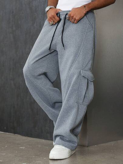 Manfinity Roghcode Men's Young Street Style, Multi-Functional INS Item: Elastic Waist Loose Patchwork Casual Sweatpants, Suitable For Street Style, Casual Daily Wear, Weekend Outings, Music Festivals, Social Gatherings And Other Young Social Occasions. This Pair Of Pants Is An Indispensable Versatile Item In A Man's Wardrobe, And Makes An Excellent Gift For Boyfriends Or Husbands.