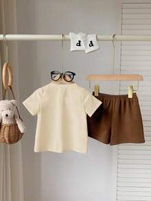 SHEIN Playful Pals 男婴两件套休闲套装，时尚卡通可爱狮子、熊、狐狸和字母印花圆领短袖T恤和短裤套装，适合春夏季节、休闲穿着、户外活动和上学穿着。 - 彩色 - 查看 2