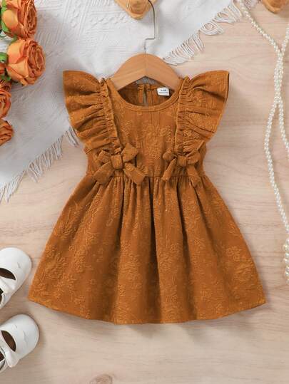 SHEIN Vintaside Kids Babyflickklänning i mjukt jacquardtyg med rund hals och volang, elegant rosett, vår/sommar