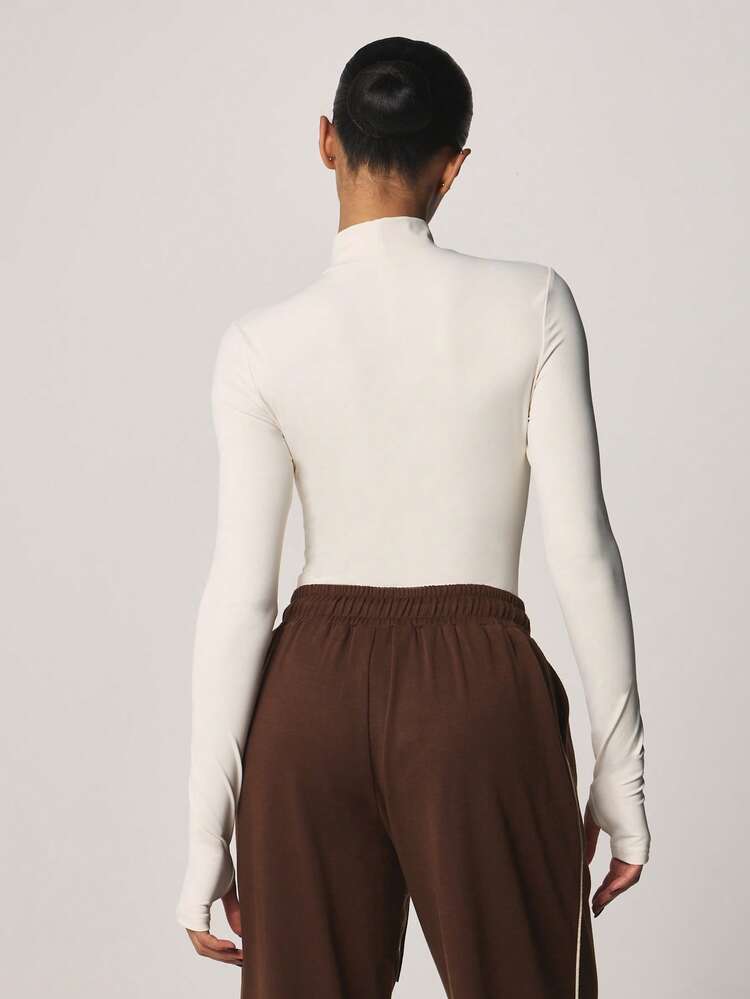 MISSGUIDED High Neck Long Sleeve Ribbed Sports Bodysuit With Chest Print Perfect For Athleisure And Training Activities