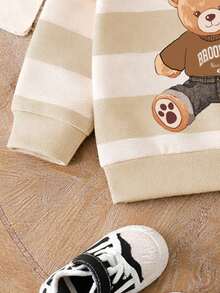 SHEIN Playful Pals Bộ 2 món đồ mặc thường ngày thời trang cho bé trai, gồm áo nỉ in hình gấu kẻ sọc và quần nỉ cùng màu, thoải mái và đa năng cho mùa thu/xuân. - Nhiều màu - Xem 6