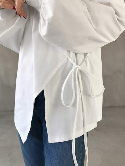 FRIFUL Women's Round Neck Loose Fit Long Sleeve Solid Color T-Shirt With Bow Tie Decor And Side Slit Hem