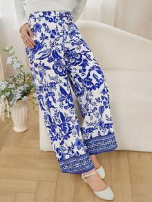 SHEIN Teenager Mädchen Pendler Stil Design Falsche Tasche Weite Bein Hose, Frühling & Herbst, Ausflug, vielseitig, schlank minimalistisch, geeignet für Schule, Pendeln, Alltagstragen, bequem, stilvoll, Lässig Hose mit Blumenmuster Hose in Weiß und Blau Gemusterte Hose Sommerhose - Blau - Übersicht 3