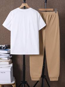 两件套青少年男童休闲卡通印花圆领短袖上衣和裤子套装，适合夏季日常穿着，适合上学、旅行、运动，适合春夏穿着。