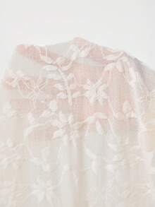 Solflare 春夏新款休闲百搭T恤，适合外出、日常穿着、派对、音乐节、返校、毕业典礼、度假、婚礼、街头风等场合。采用甜心领口设计，胸前褶皱装饰，不对称荷叶边下摆，荷叶边袖口修饰手臂线条，提花针织面料，米色，修身版型，大码可选。 - 米色 - 查看 7