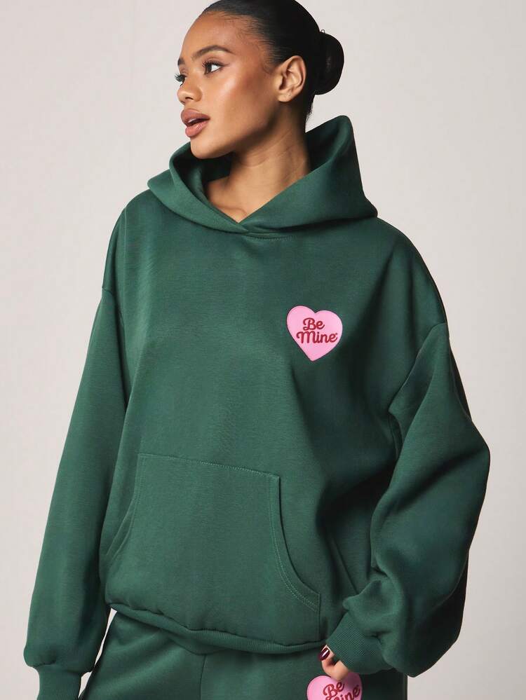 MISSGUIDED Damen Oversized Kapuzensweatshirt mit Valentinstag Herzchen Club "Sei Mein" Herz Grafik Muster Pullover Kapuzenpullover Langarm Lässig