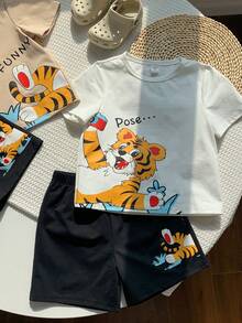 SHEIN Conjunto de 4 piezas de camiseta y pantalones cortos con estampado de tigre lindo para niño pequeño - Multicolor - Ver 5