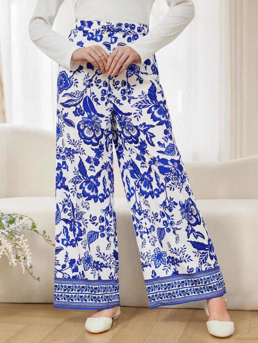 SHEIN Teenager Mädchen Pendler Stil Design Falsche Tasche Weite Bein Hose, Frühling & Herbst, Ausflug, vielseitig, schlank minimalistisch, geeignet für Schule, Pendeln, Alltagstragen, bequem, stilvoll, Lässig Hose mit Blumenmuster Hose in Weiß und Blau Gemusterte Hose Sommerhose - Blau - Übersicht 1