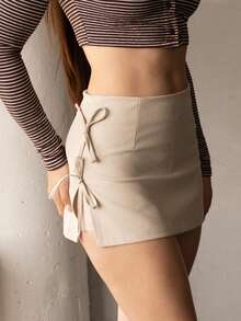 Andrea Bello Minifalda de corte A con abertura sexy, estilo lazada y encaje, para mujer, diseño de primavera/verano - Albaricoque - Ver 6