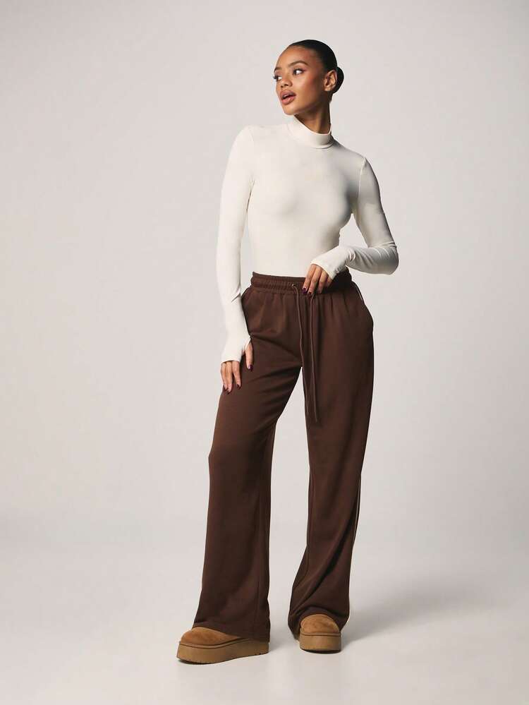 MISSGUIDED High Neck Long Sleeve Ribbed Sports Bodysuit With Chest Print Perfect For Athleisure And Training Activities