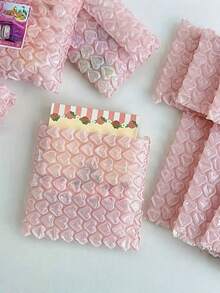 20 piezas de bolsas de burbujas con forma de corazón, antiestáticas, a prueba de golpes y antideslizantes, que se pueden usar como bolsas de envío, bolsas de almacenamiento, bolsas de embalaje de regalos, tarjetas de autosellado y sobres de regalo, así como embalaje de papelería. Son adecuados para ocasiones como Navidad, aniversarios, cumpleaños, compromisos y San Valentín. - Multicolor - Ver 1