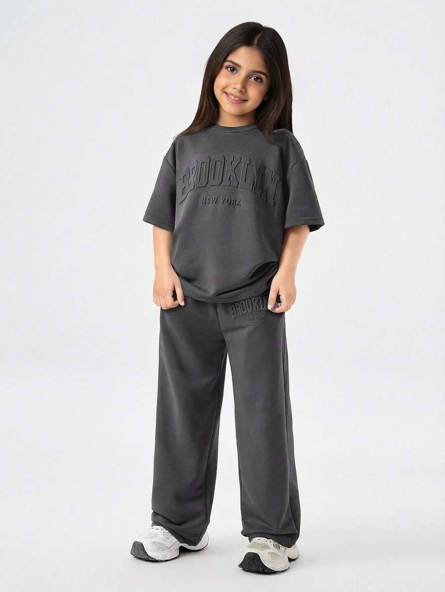 SHEIN Tween Girls' Loose Casual Minimalist Comfortable Round Neck Drop Shoulder Short Sleeve T-Shirt And Pants Set Summer Outfits - Black - View 1