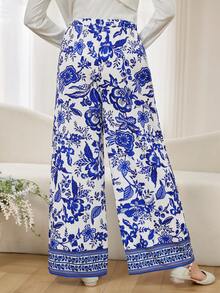 SHEIN Teenager Mädchen Pendler Stil Design Falsche Tasche Weite Bein Hose, Frühling & Herbst, Ausflug, vielseitig, schlank minimalistisch, geeignet für Schule, Pendeln, Alltagstragen, bequem, stilvoll, Lässig Hose mit Blumenmuster Hose in Weiß und Blau Gemusterte Hose Sommerhose - Blau - Übersicht 2