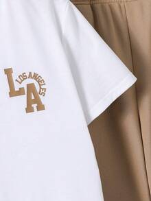 两件套青少年男童休闲卡通印花圆领短袖上衣和裤子套装，适合夏季日常穿着，适合上学、旅行、运动，适合春夏穿着。