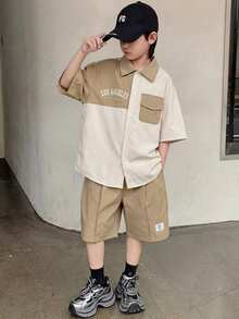 SHEIN 两件套儿童/青少年男童休闲舒适撞色拼接 Polo 领开襟宽松短袖衬衫和宽松卡其色短裤套装，运动服，卡其色衬衫套装，基础款上衣，基础款下装，适合春夏季节、外出、情人节、约会、旅行、度假、家庭聚会、返校、婚礼、正式活动、运动、生日派对等场合。 - 彩色 - 查看 2