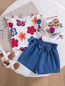 Bộ 2 món cho bé gái mùa hè, gồm áo thun cổ tròn tay bồng in hoa đơn giản và quần short xanh trơn có nơ phía trước, trang phục thường ngày dễ thương. - Màu xanh lam - Xem 4