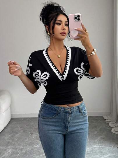 SHEIN Elenzya Women's Fitted Deep V-Neck Short Sleeve T-Shirt, Comfortable Black Fabric With Black & White Contrast Trim Graphic Print Top