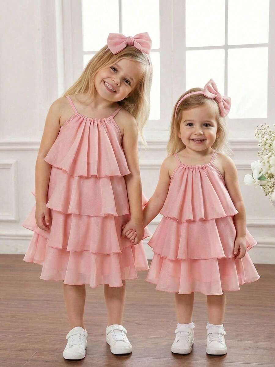 SHEIN 女童纯色荷叶边无袖连衣裙，适合正式场合、圣诞节、姐妹装、母女装、派对等场合，也可作为圣诞女童连衣裙或秋冬女童连衣裙穿着。 - 淺粉色 - 查看 1