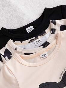 SHEIN 6件套女婴夏季可爱休闲简约杏色和黑色圆领短袖T恤上衣，带印花蝴蝶结，搭配3套同款短裤，适合日常和上学穿着。 - 黑色 - 查看 4