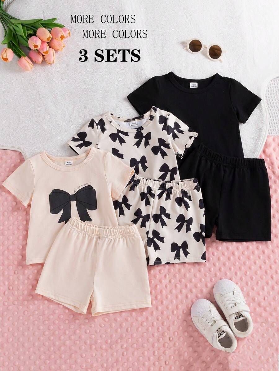 SHEIN 6件套女婴夏季可爱休闲简约杏色和黑色圆领短袖T恤上衣，带印花蝴蝶结，搭配3套同款短裤，适合日常和上学穿着。 - 黑色 - 查看 1