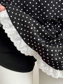 Elamini Bộ đồ gồm áo vest không tay cổ chữ V buộc dây phía sau in chấm bi đen và chân váy ngắn cạp thấp xếp ly, kết hợp với quần legging viền ren tương phản, kiểu dáng thanh lịch cổ điển, thoải mái, phù hợp đi làm, đi học, đa năng cho mùa xuân/hè. - màu đen - Xem 6