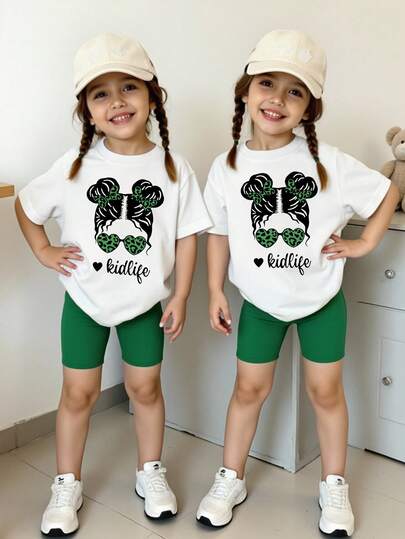 Spring And Summer Young Girls Casual Fashion Creative Personalized Fresh Minimalist Cute Cartoon Leopard Bow Sunglasses Heart Shaped Letter Graphic Print Casual Basic Short T-Shirt + Bike Shorts Set, Comfortable Cozy Summer And Fall Styles Suitable For Spring, Summer, Autumn Daily Sports Outfits, Green Leggings And Shorts Summer Outfit, All Season Wear Young Girls Cute Set Sisters Matching Outfit 2 Piece Set For Kids Young Girls Twin Young Girls Clothes For Summer That Has Shorts Two Piece Cute Set Kids