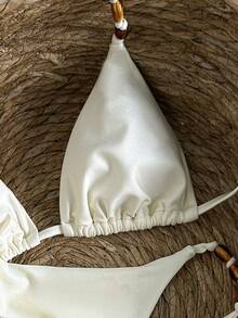 Swim Vcay Bộ bikini gợi cảm hở lưng buộc cổ, đính hạt cườm, chất liệu bóng mượt, thích hợp cho kỳ nghỉ biển. - trắng - Xem 5