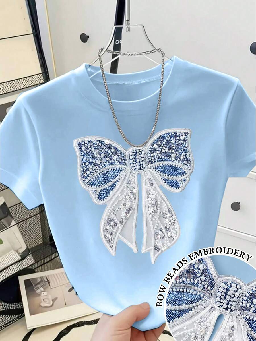 Resyla Women's Beaded Bow Decor Round Neck Short Sleeve T-Shirt - Baby Blue - View 1
