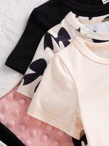 SHEIN 6件套女婴夏季可爱休闲简约杏色和黑色圆领短袖T恤上衣，带印花蝴蝶结，搭配3套同款短裤，适合日常和上学穿着。 - 黑色 - 查看 7