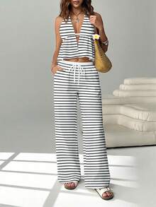 SHEIN EZwear Bộ 2 món gồm áo hai dây buộc phía trước hở lưng và quần ống rộng có dây rút, thích hợp cho hộp đêm, kỳ nghỉ, bãi biển, tiệc tùng, Hawaii và nhiều dịp khác. Họa tiết kẻ sọc đen trắng. - Nhiều màu - Xem 7