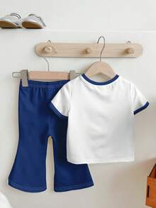 SHEIN 两件套少女休闲可爱珍珠蝴蝶结印花T恤和喇叭裤，时尚学院风、度假风、返校季必备，圆领短袖T恤搭配喇叭裤，适合夏季、日常休闲穿着，百搭基础款