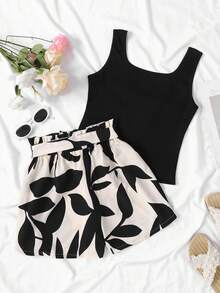 SHEIN Kids Summer Outfits  Squishy TEEN GIRL Black Tank Top & Khaki Leaf Print Loose Shorts Set, Vacation Style Suitable For Summer Two Piece Summer Outfits Two Piece Sets Cute Two Piece Sets Girls Two Piece Sets - Apricot - View 2