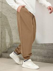 Manfinity Homme Plus Size Men's Solid Color Drawstring Waist Pockets Casual Jogger Pants Khaki Baggy Pants Men Japanese Pants Men Men Loose Fit Pants Brown Sweatpants Men - Khaki - View 6