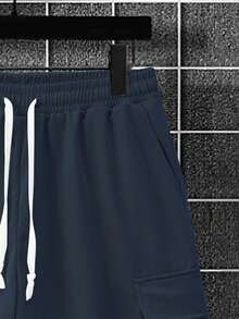 Manfinity Homme Bộ đồ nam mùa hè kiểu dáng thường ngày, gồm áo thun ngắn tay màu trơn và quần short kaki. - Màu xanh hải quân - Xem 5