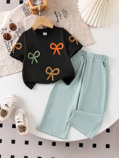 Baby Girls' Sweet Cute Fashionable Bowknot Decor Short Sleeve Black Top Paired With Solid Green Pants Casual Simple Summer T-Shirt Set