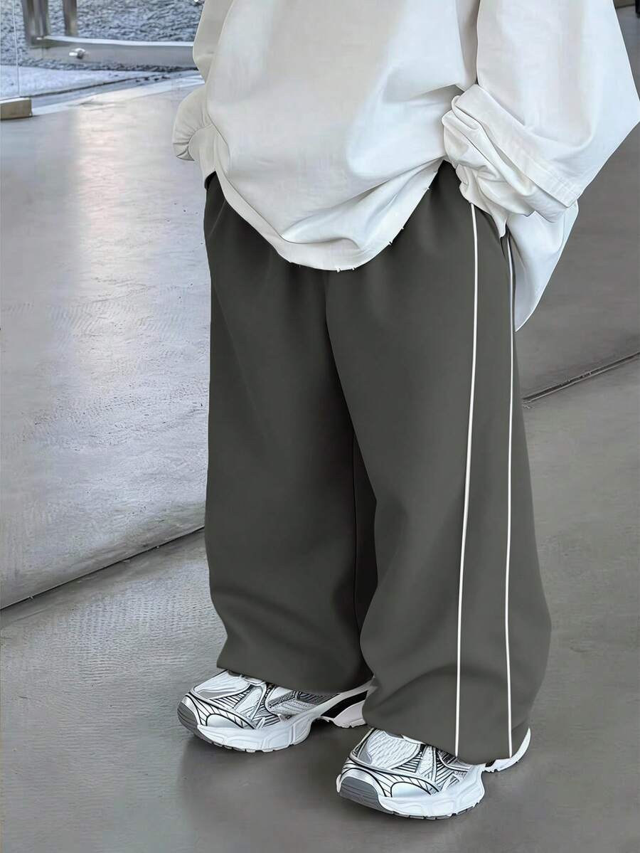 SHEIN 1 قطعة بنطلون رياضي كاجوال للأولاد، ساق مستقيمة، أنيق، عملي، ناعم ومريح، مزين بسحاب، مناسب للارتداء اليومي، المدرسة، الخارج، الرياضة، الربيع/الصيف/الخريف/الشتاء - رمادي - مشاهدة 1